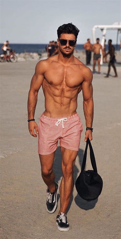 naked male on the beach